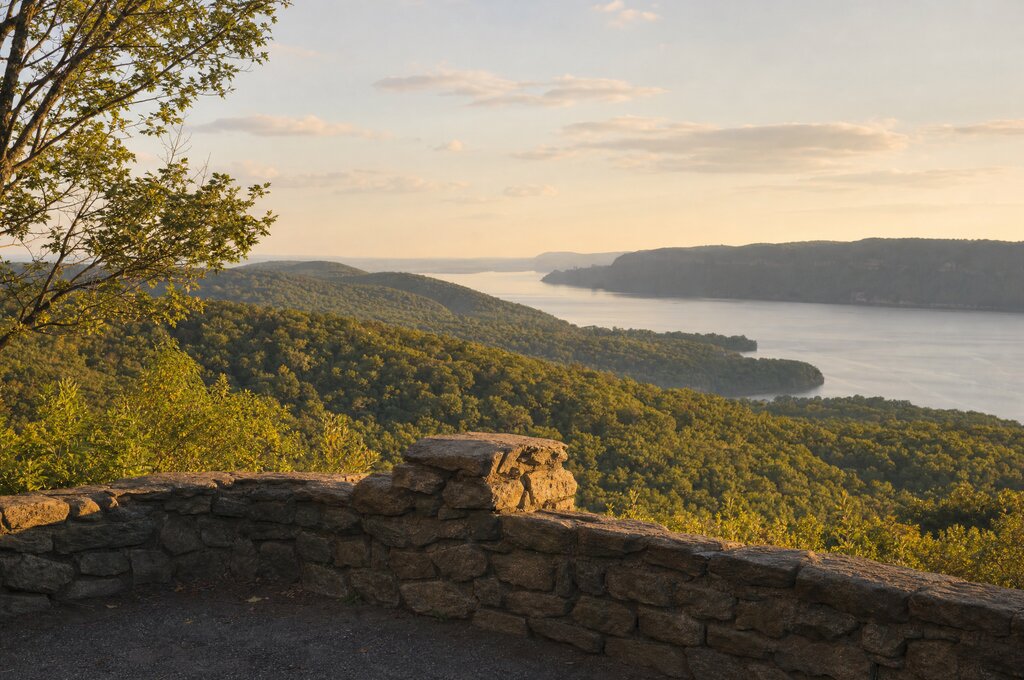 Scenic overlook of rolling green hills and the Hudson River